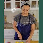 Mom cutting mango