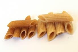 Side by side cooked and uncooked whole grain pasta