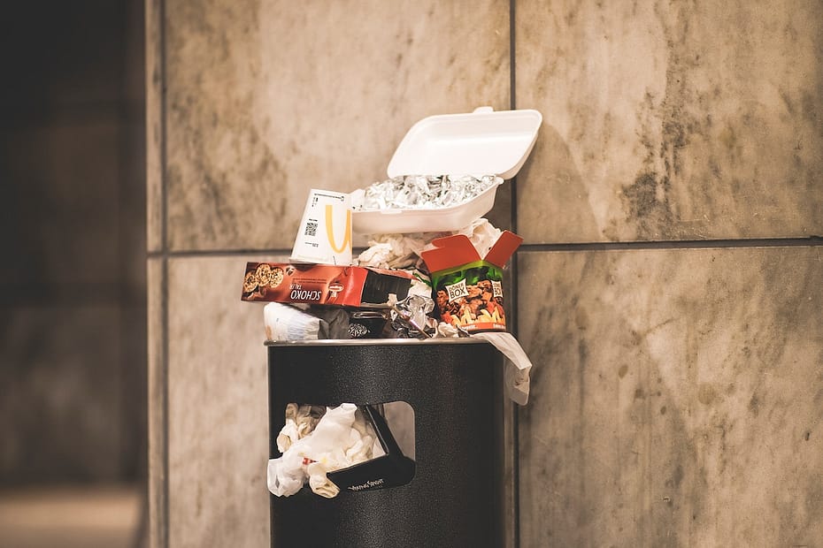 Trash full of food